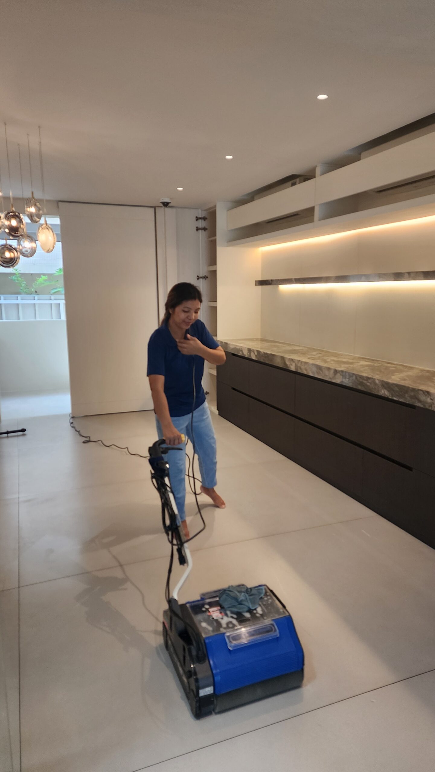 Floor Deep Cleaning with Scrubber Machine removing fine renovation dust